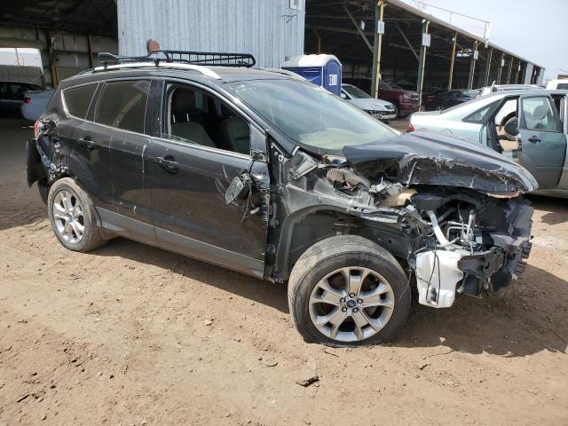 Photo 4 from auction – 2014 FORD ESCAPE TIT with VIN 1FMCU9J99EUA24134
