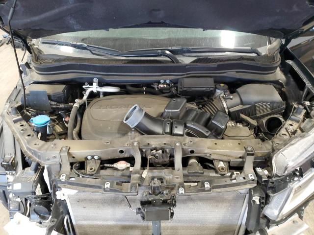 Photo 12 from auction – 2021 HONDA PILOT BLAC with VIN 5FNYF6H7XMB022830