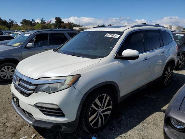 Photo 1 from auction – 2017 HONDA PILOT TOUR with VIN 5FNYF5H97HB009955