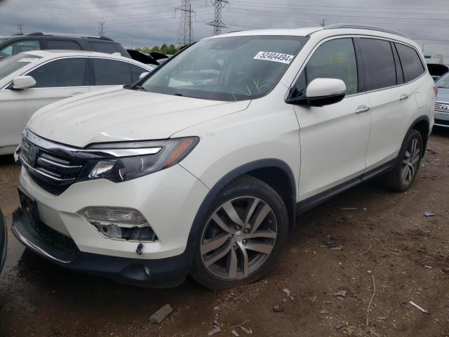 HONDA PILOT TOUR 2017 with VIN 5FNYF6H96HB001058 - Photo from auction