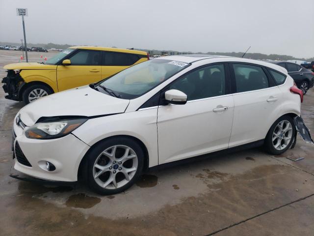FORD FOCUS TITA 2014 with VIN 1FADP3N23EL128043 - Photo from auction