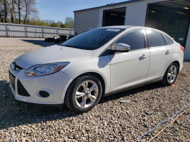 FORD FOCUS SE 2014 with VIN 1FADP3F23EL186412 - Photo from auction