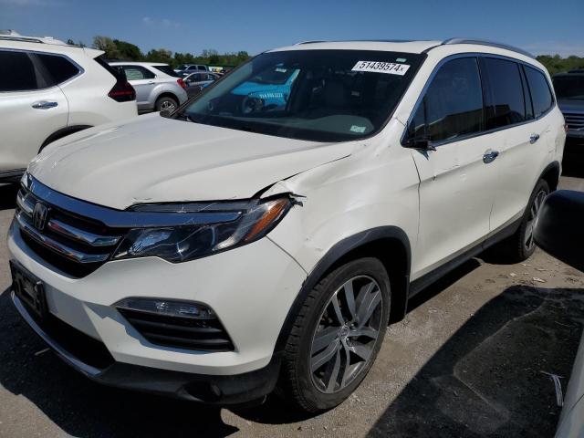 HONDA PILOT TOUR 2016 with VIN 5FNYF6H93GB024067 - Photo from auction