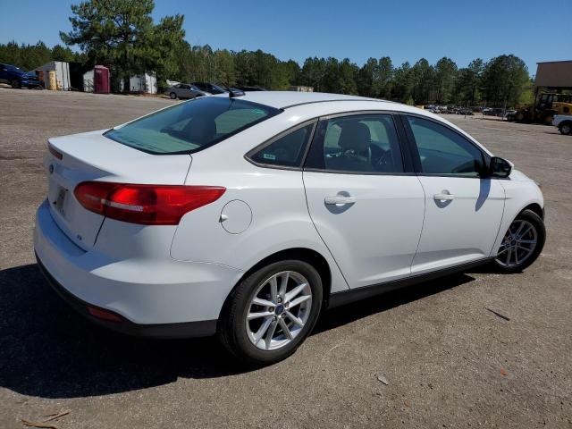 Photo 3 from auction – 2018 FORD FOCUS SE with VIN 1FADP3F21JL324510
