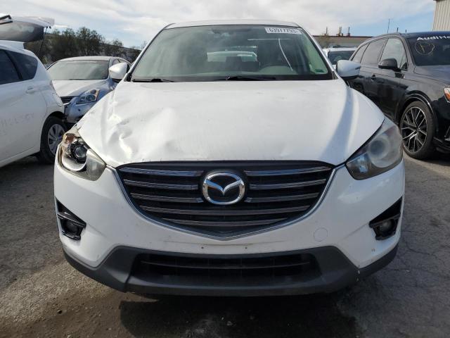 Photo 5 from auction – 2016 MAZDA CX-5 GT with VIN JM3KE2DYXG0754384