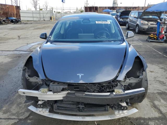 Photo 5 from auction – 2022 TESLA MODEL 3 with VIN 5YJ3E1EA3NF304096