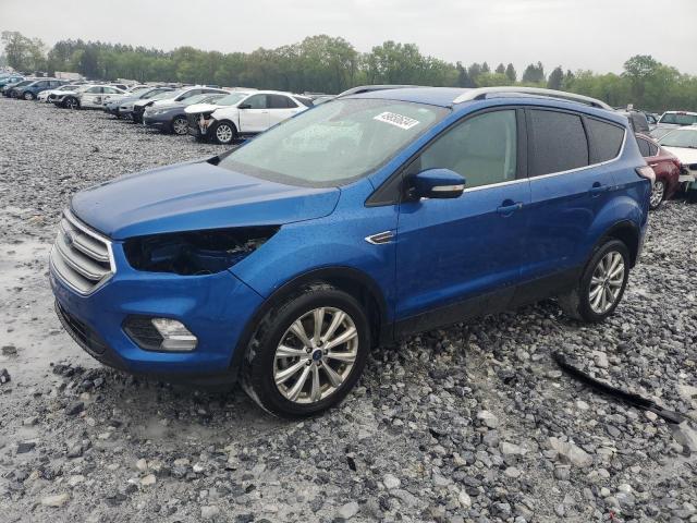 FORD ESCAPE TIT 2017 with VIN 1FMCU0J97HUF01546 - Photo from auction