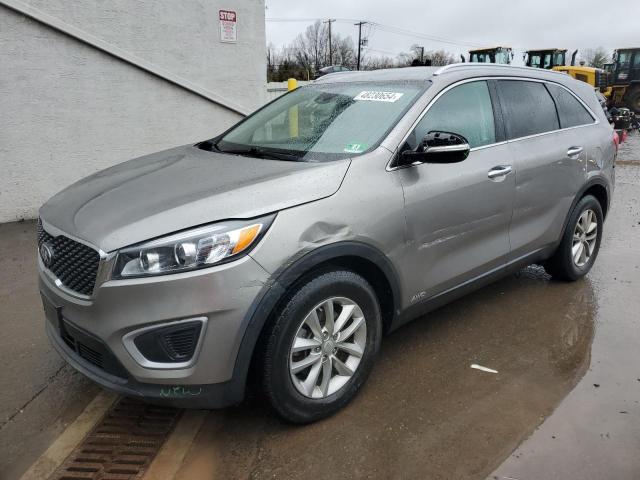 KIA SORENTO LX 2018 with VIN 5XYPGDA33JG348705 - Photo from auction