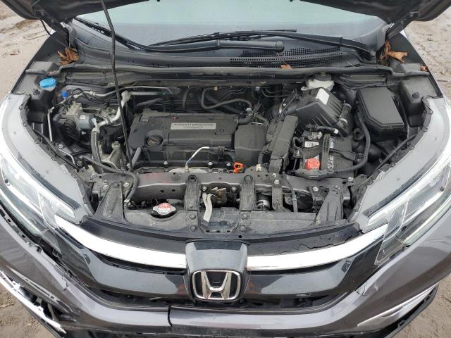 Photo 11 from auction – 2015 HONDA CR-V EX with VIN 5J6RM4H58FL108354