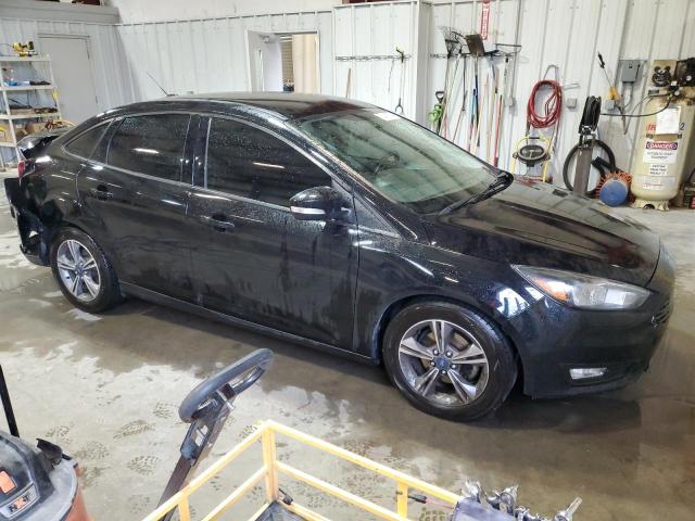 Photo 4 from auction – 2018 FORD FOCUS SE with VIN 1FADP3FE0JL211108