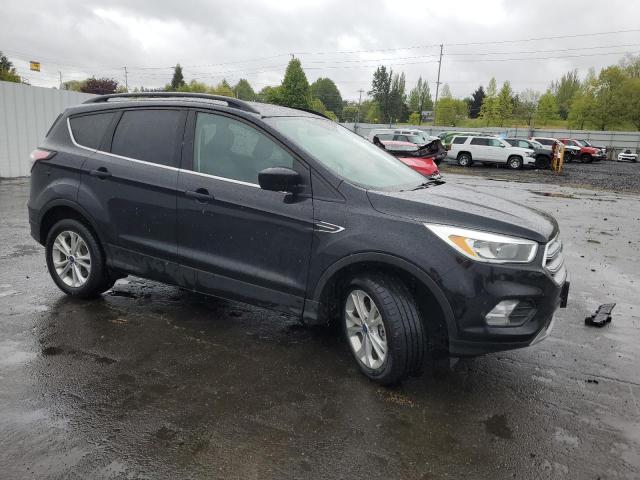 Photo 4 from auction – 2018 FORD ESCAPE SE with VIN 1FMCU9GD6JUB15691
