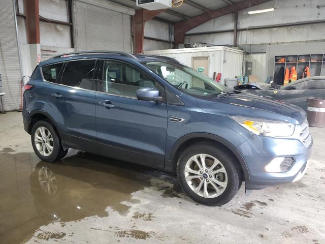 Photo 4 from auction – 2018 FORD ESCAPE SEL with VIN 1FMCU9HD9JUC74395