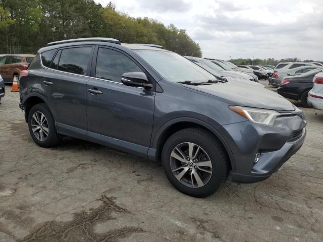 Photo 4 from auction – 2017 TOYOTA RAV4 XLE with VIN JTMWFREV2HD105192