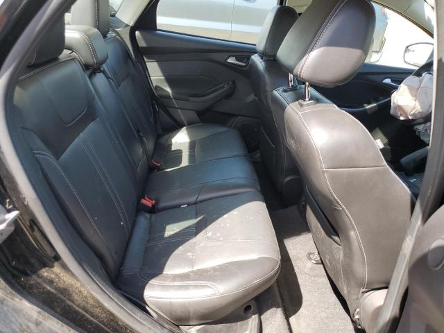 Photo 10 from auction – 2014 FORD FOCUS TITA with VIN 1FADP3J29EL241601