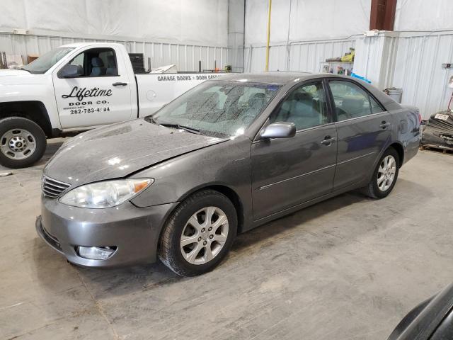 TOYOTA CAMRY LE 2005 with VIN 4T1BE30K75U971859 - Photo from auction