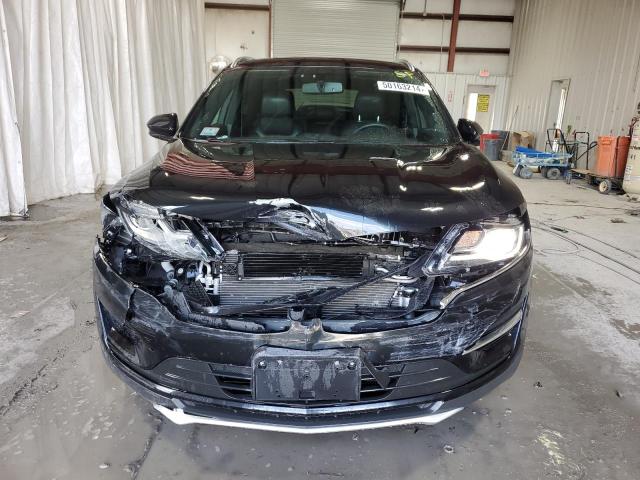 Photo 5 from auction – 2015 LINCOLN MKC with VIN 5LMCJ2A95FUJ44852