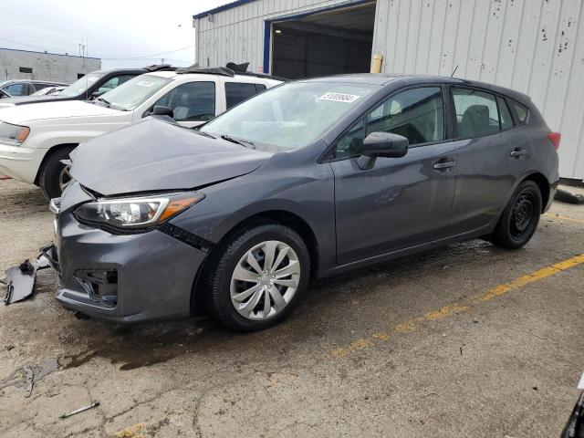 SUBARU IMPREZA 2019 with VIN 4S3GTAA65K3741020 - Photo from auction