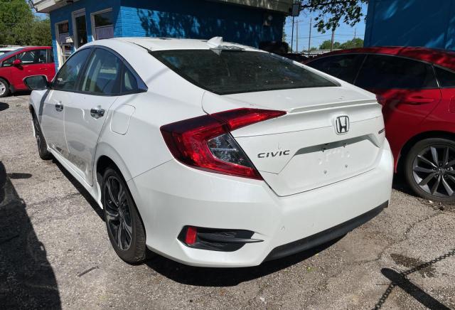Photo 3 from auction – 2017 HONDA CIVIC TOUR with VIN 19XFC1F92HE027166