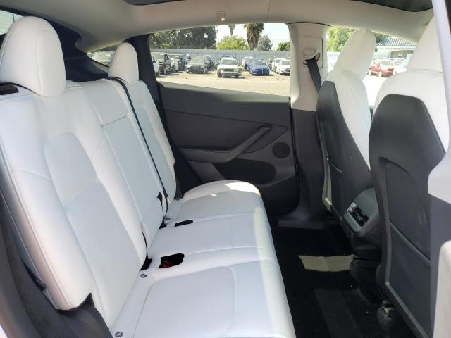 Photo 11 from auction – 2023 TESLA MODEL Y with VIN 7SAYGDEE8PF616800
