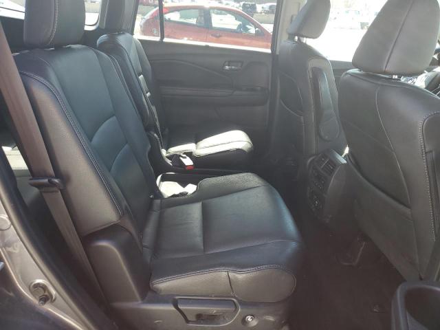 Photo 11 from auction – 2022 HONDA PILOT TOUR with VIN 5FNYF6H69NB017627