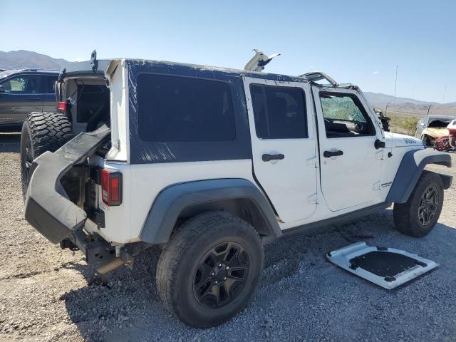 Photo 3 from auction – 2014 JEEP WRANGLER U with VIN 1C4BJWDG1EL285393