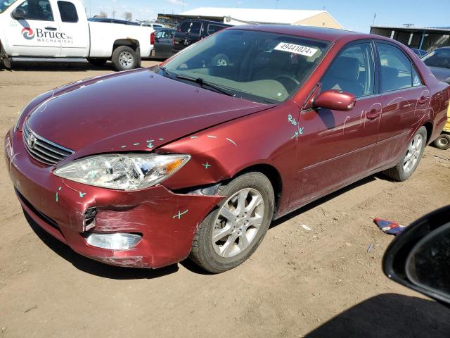 TOYOTA CAMRY LE 2005 with VIN JTDBF30K750166209 - Photo from auction