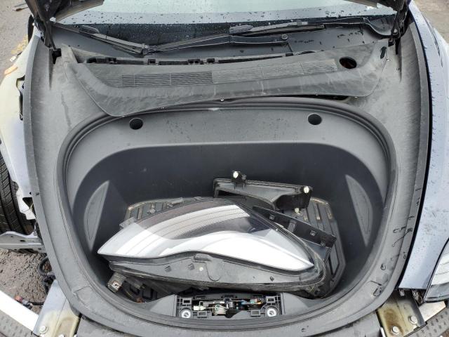 Photo 11 from auction – 2022 TESLA MODEL 3 with VIN 5YJ3E1EB7NF343945