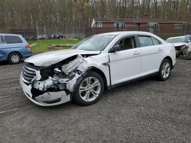 FORD TAURUS SE 2017 with VIN 1FAHP2D81HG145180 - Photo from auction