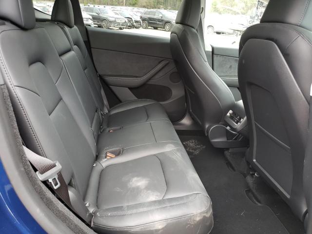 Photo 10 from auction – 2023 TESLA MODEL Y with VIN 7SAYGDEE1PA196682