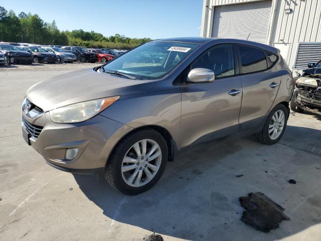 HYUNDAI TUCSON GLS 2012 with VIN KM8JUCAC4CU382822 - Photo from auction