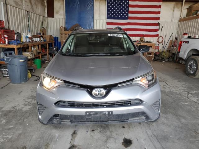 Photo 5 from auction – 2018 TOYOTA RAV4 LE with VIN JTMBFREV7JD251141