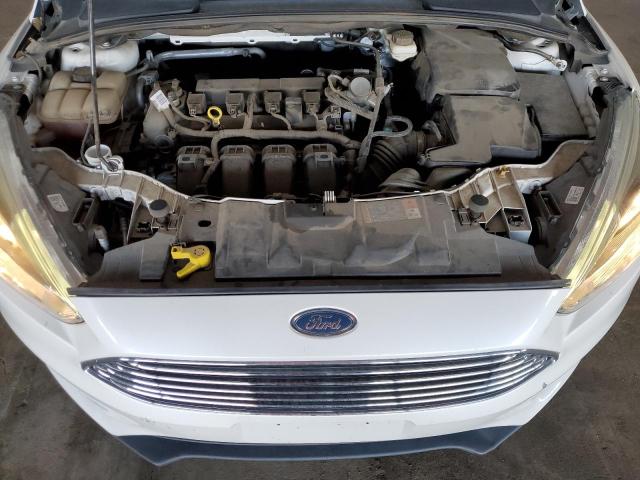 Photo 11 from auction – 2017 FORD FOCUS TITA with VIN 1FADP3N23HL287939