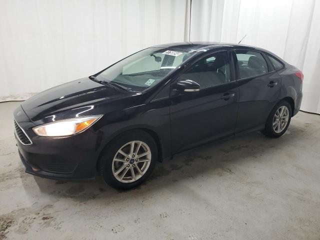 FORD FOCUS SE 2017 with VIN 1FADP3F21HL227849 - Photo from auction
