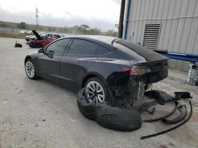 Photo 2 from auction – 2023 TESLA MODEL 3 with VIN 5YJ3E1EA8PF490138