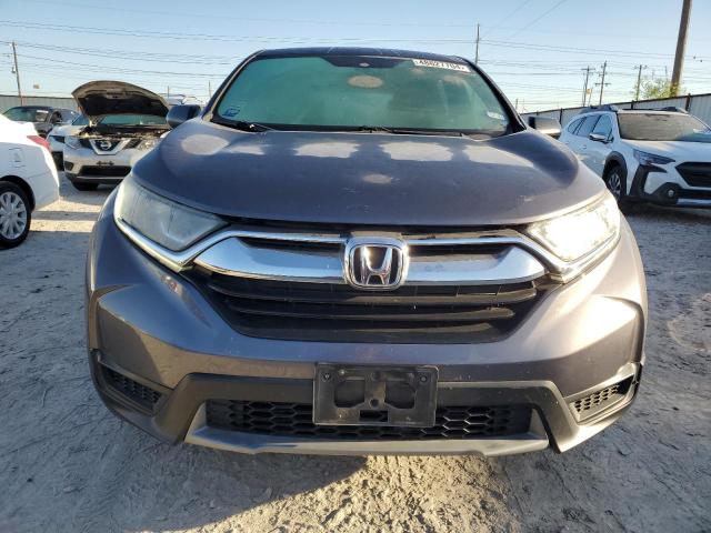 Photo 5 from auction – 2017 HONDA CR-V LX with VIN 7FARW5H3XHE001031