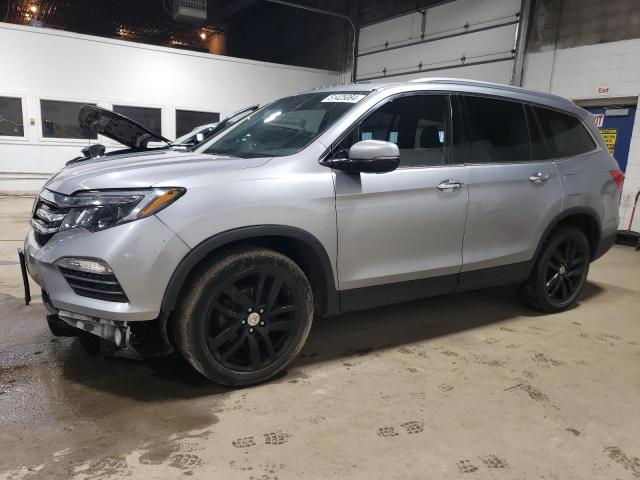 HONDA PILOT ELIT 2016 with VIN 5FNYF6H01GB044044 - Photo from auction