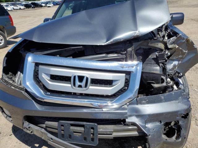 Photo 12 from auction – 2011 HONDA PILOT TOUR with VIN 5FNYF4H94BB081102