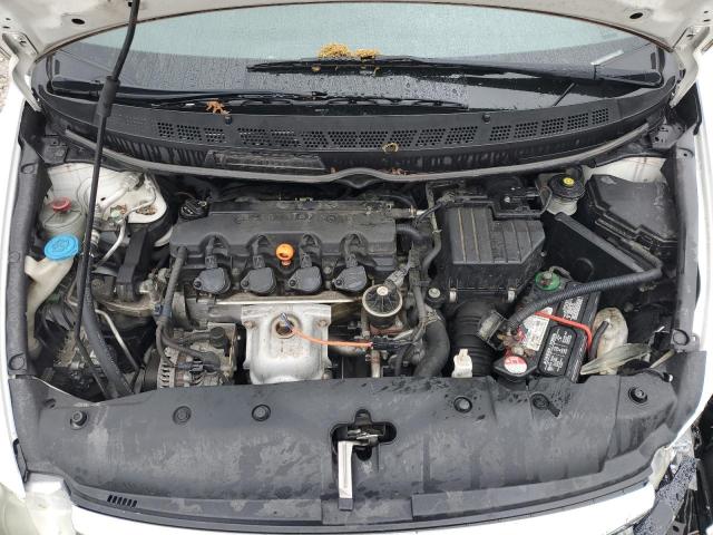 Photo 11 from auction – 2011 HONDA CIVIC LX with VIN 19XFA1F57BE035287
