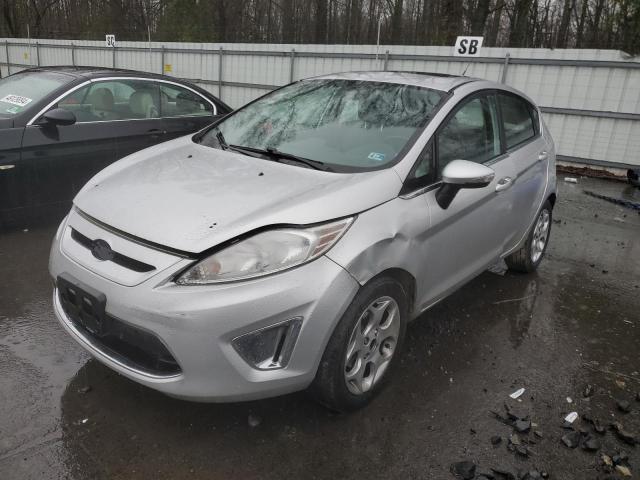 FORD FIESTA SES 2011 with VIN 3FADP4FJ0BM203044 - Photo from auction