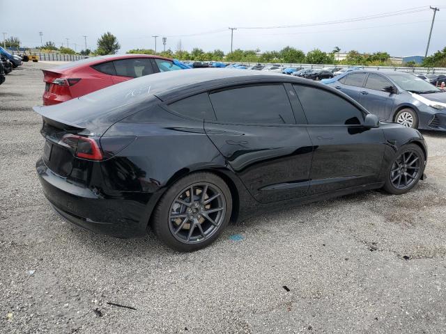 Photo 3 from auction – 2023 TESLA MODEL 3 with VIN 5YJ3E1EA2PF495769