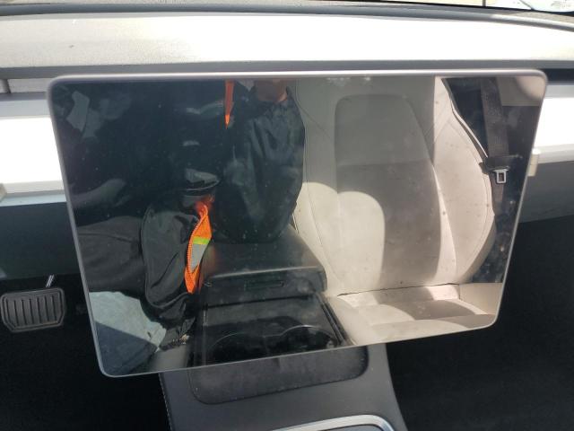 Photo 9 from auction – 2021 TESLA MODEL 3 with VIN 5YJ3E1EA5MF873191