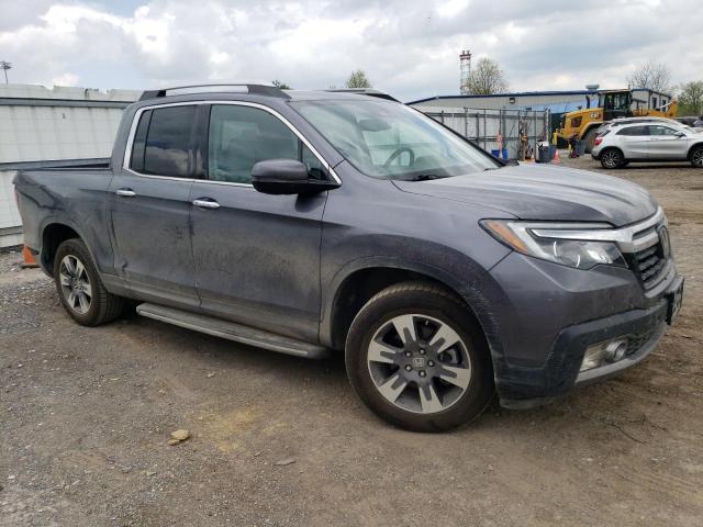Photo 4 from auction – 2017 HONDA RIDGELINE with VIN 5FPYK3F71HB005554