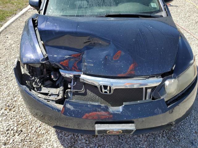 Photo 11 from auction – 2006 HONDA CIVIC LX with VIN 1HGFA16556L022780