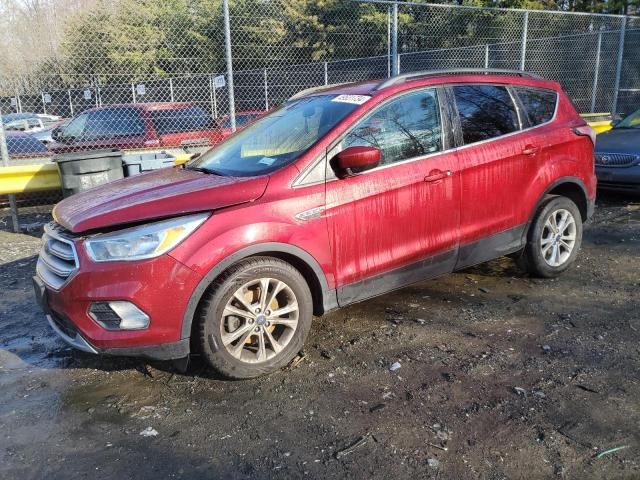 FORD ESCAPE SE 2018 with VIN 1FMCU0GD4JUA53834 - Photo from auction