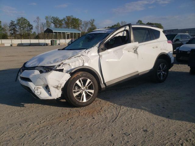 TOYOTA RAV4 XLE 2017 with VIN JTMWFREV1HD104874 - Photo from auction
