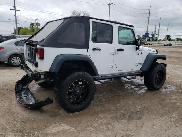 Photo 3 from auction – 2014 JEEP WRANGLER U with VIN 1C4BJWFG0EL290954