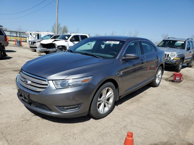 FORD TAURUS SEL 2014 with VIN 1FAHP2E81EG155976 - Photo from auction