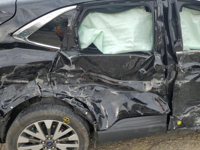 Photo 11 from auction – 2020 FORD ESCAPE TIT with VIN 1FMCU9J91LUA92926