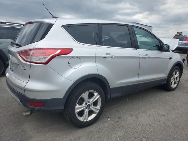 Photo 3 from auction – 2015 FORD ESCAPE SE with VIN 1FMCU9GX0FUA85847