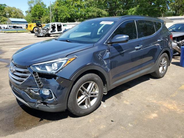 HYUNDAI SANTA FE S 2017 with VIN 5NMZU3LB0HH007942 - Photo from auction